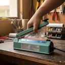 Behmont - IMP - Equipamientos - Selladora manual 20 cm 220 W - Hierro